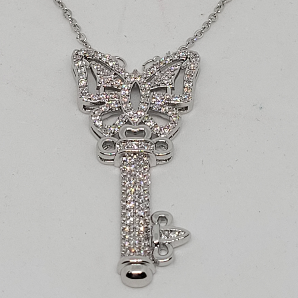 NWT necklace 925 silver pendant, white lab created sapphire butterfly key